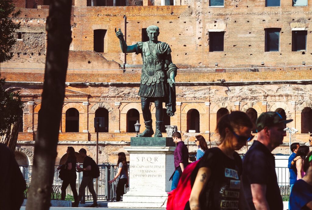 statue of julius ceasar in a crowded square