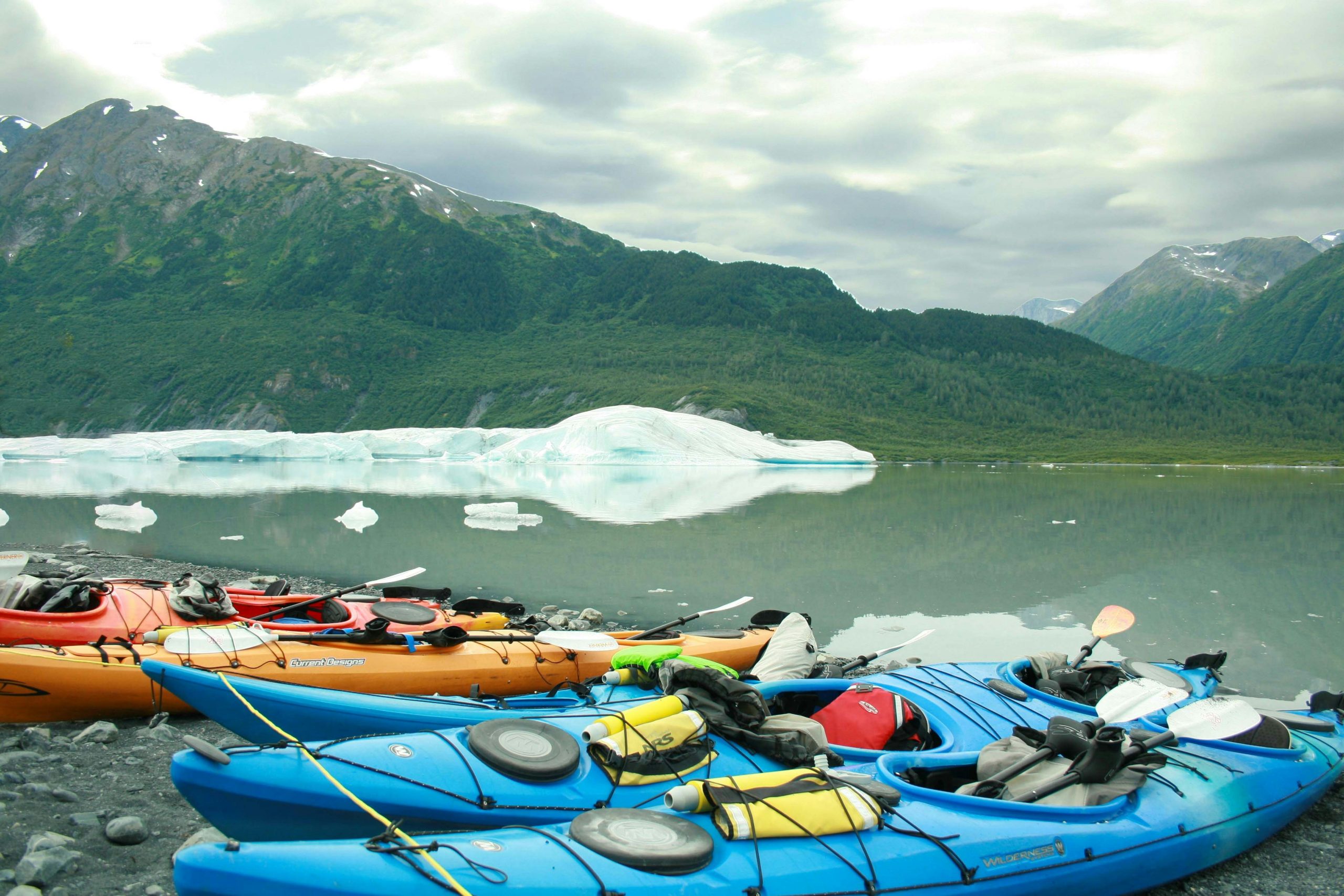 Kayaks on an icy lake